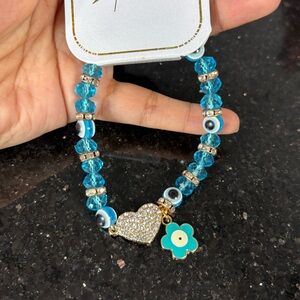 ✨5/$25 Deal!✨ Turquoise Crystal Heart & Flower Bracelet